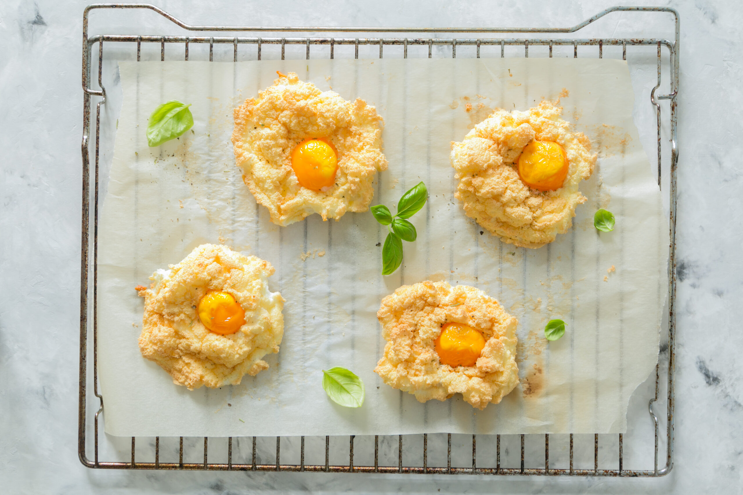 Trendy healthy eating concept - egg clouds on toasts